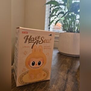 POP MART The Monsters Have A Seat Labubu Vinyl Face Mystery Box.